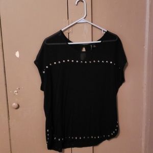 All black fashion top with silver accent